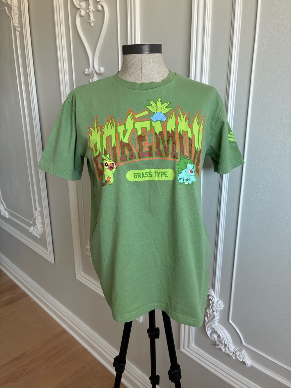 Pokemon Woman’s ' Green Grass‎ Type Graphic Tee with Yellow & Blue Accents
